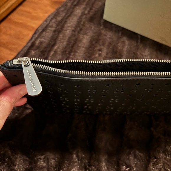 Michael Kors Women’s Floral Perforated Large Zip Clutch - Picture 8 of 13